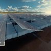 Floating solar panels mounted to Modular Docking floats on a lake