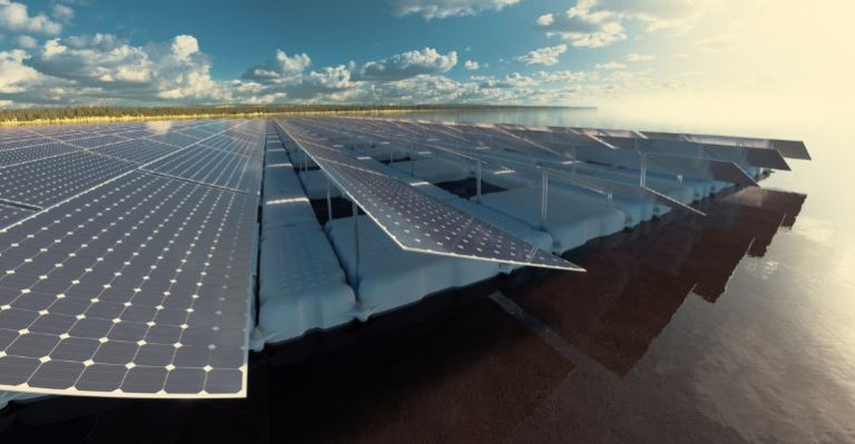 Floating solar panels mounted to Modular Docking floats on a lake