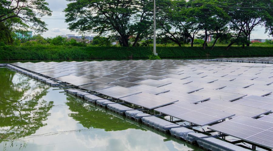 Floating solar panels on a waste water dam to produce electricity