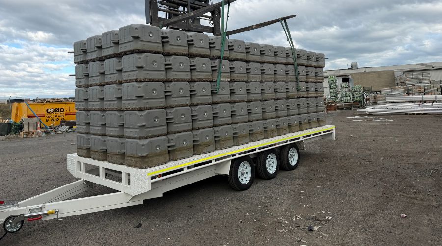 Modular docking being transported by road to job site